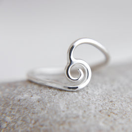 Swirled wave ring