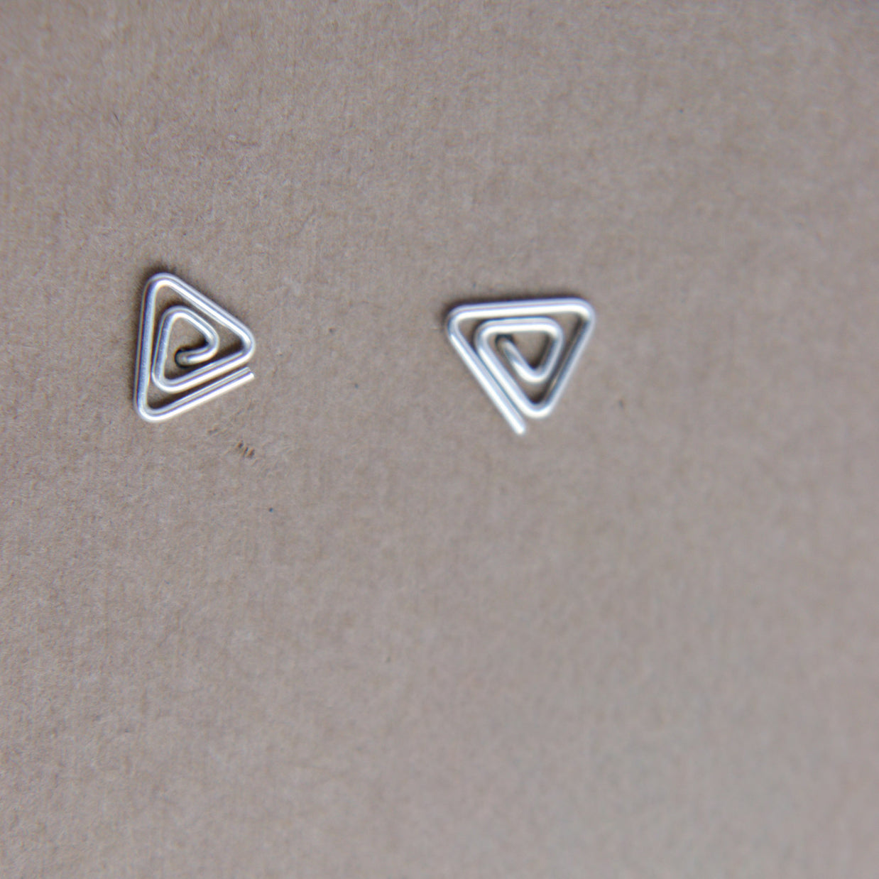 Triangle swirl studs