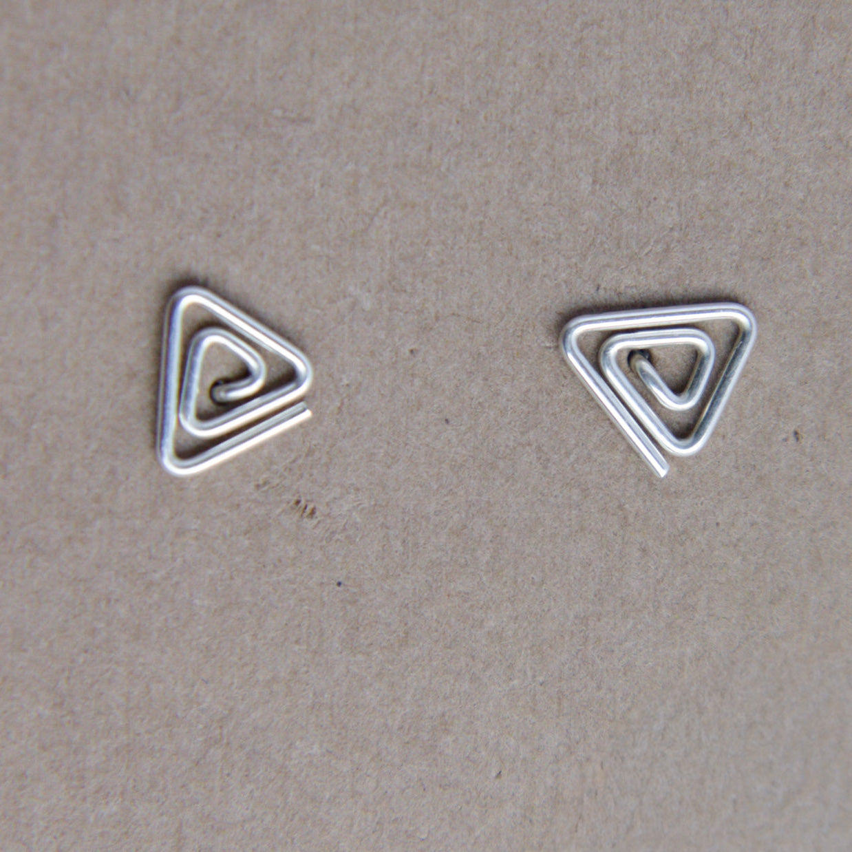 Triangle swirl studs