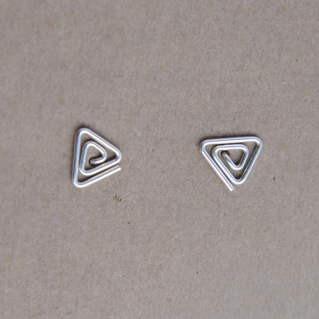 Triangle swirl studs