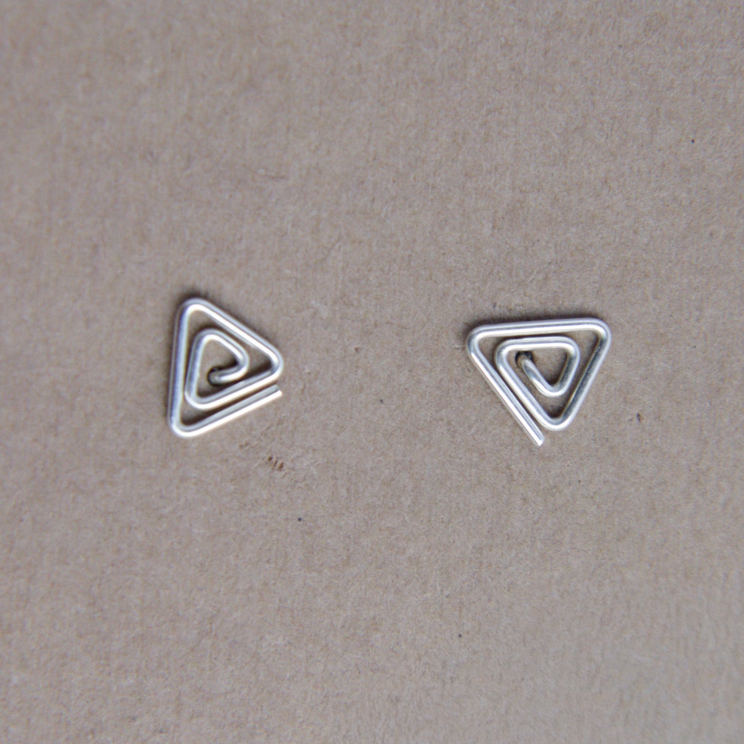 Triangle swirl studs