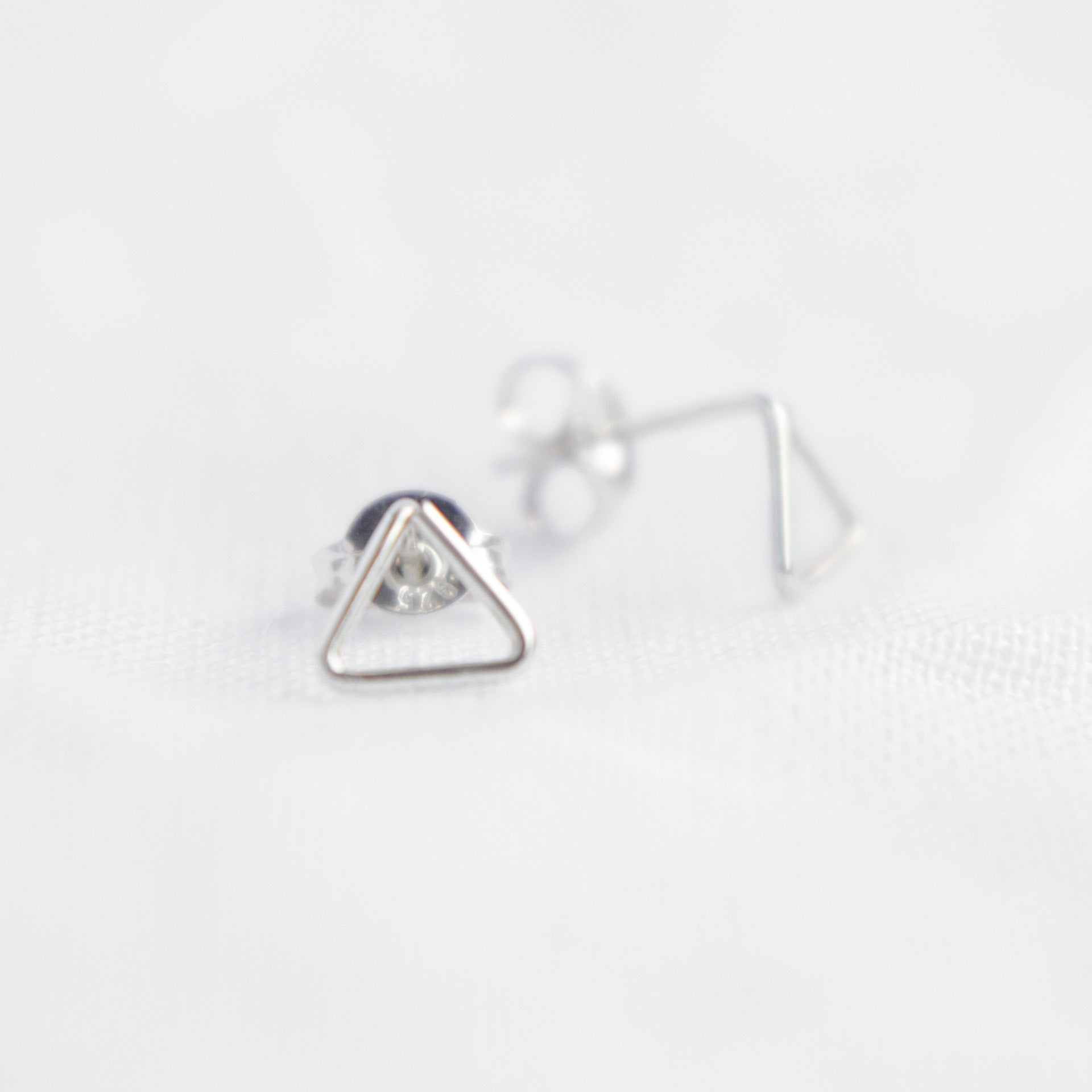 Triangle studs