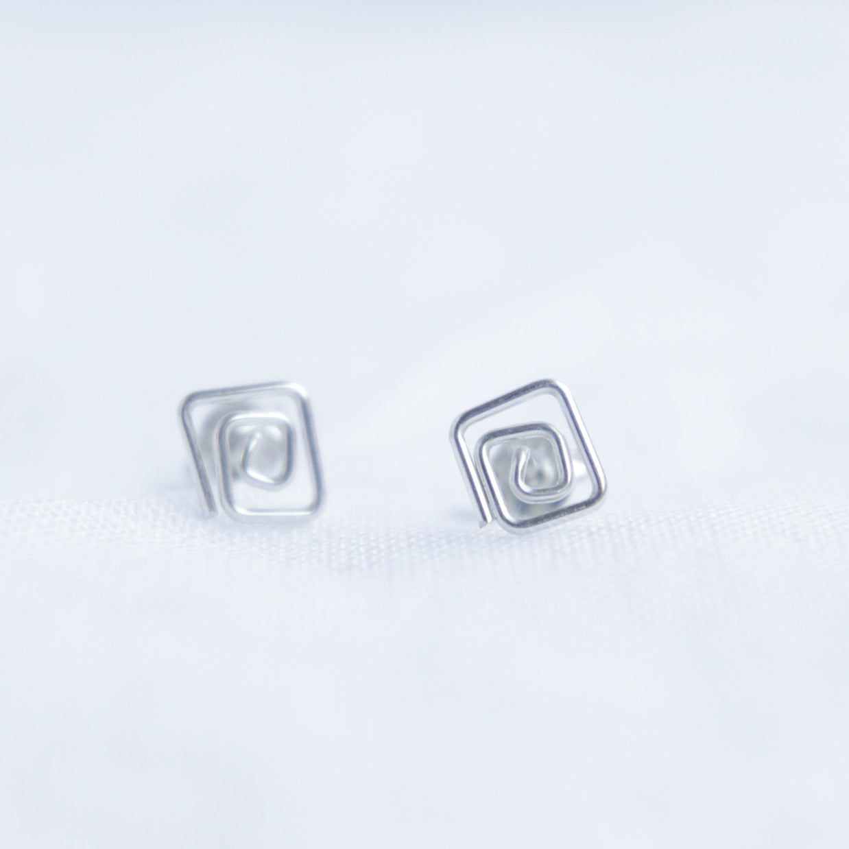 Square swirl studs