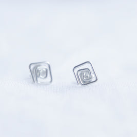 Square swirl studs